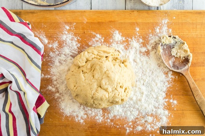 Perfect Homemade Pizza Crust 8 pizza dough on floured wooden board