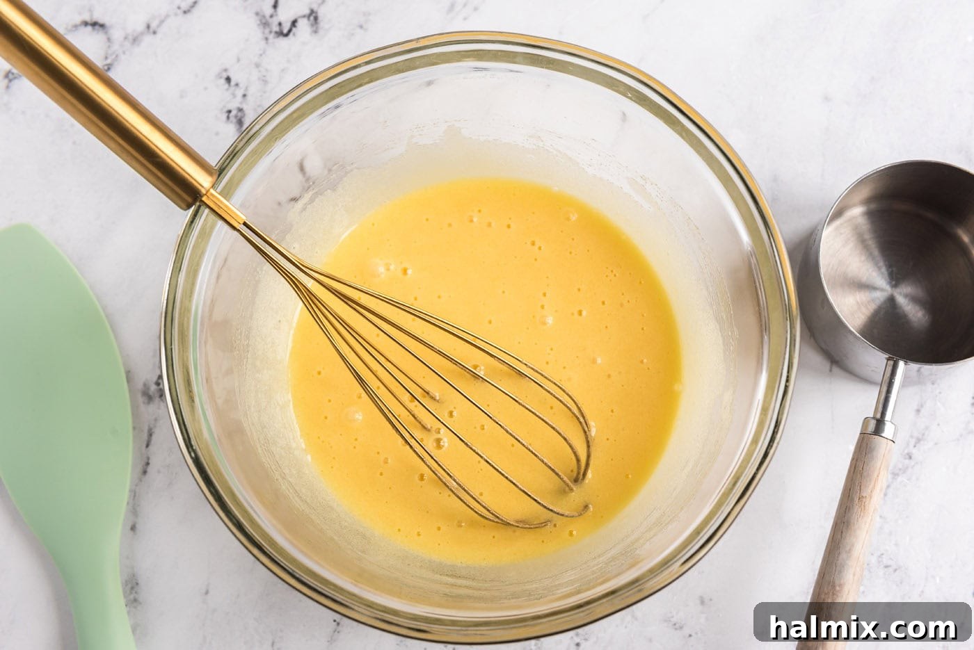 whisked egg and sugar in a bowl