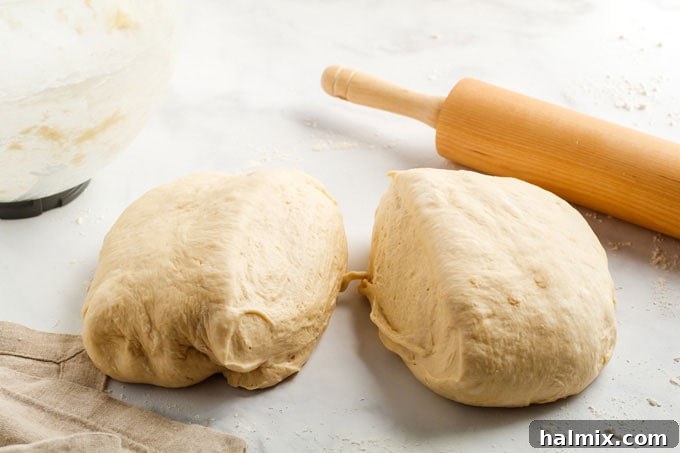 bread dough separated into two pieces