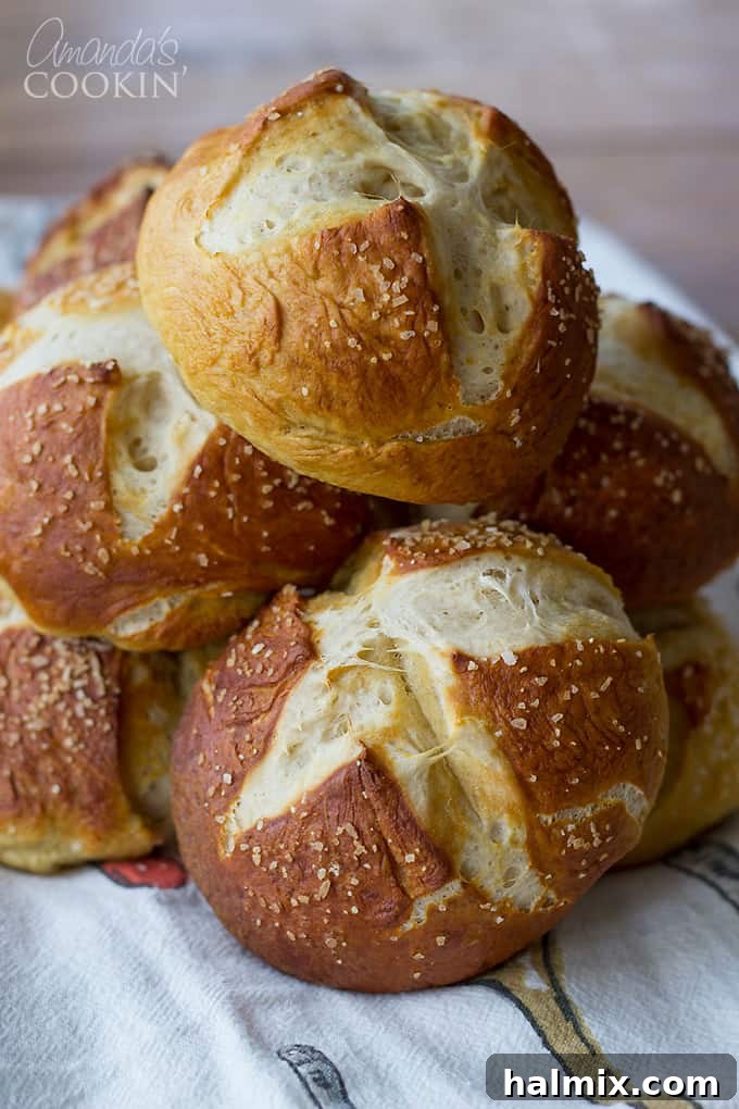 A close-up shot of bretzel rolls nestled in a bowl, highlighting their appealing golden-brown color.