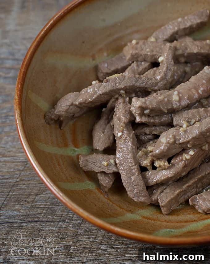 Wok-Tossed Pepper Beef 6 An overhead of a bowl filled with Chinese pepper steak.