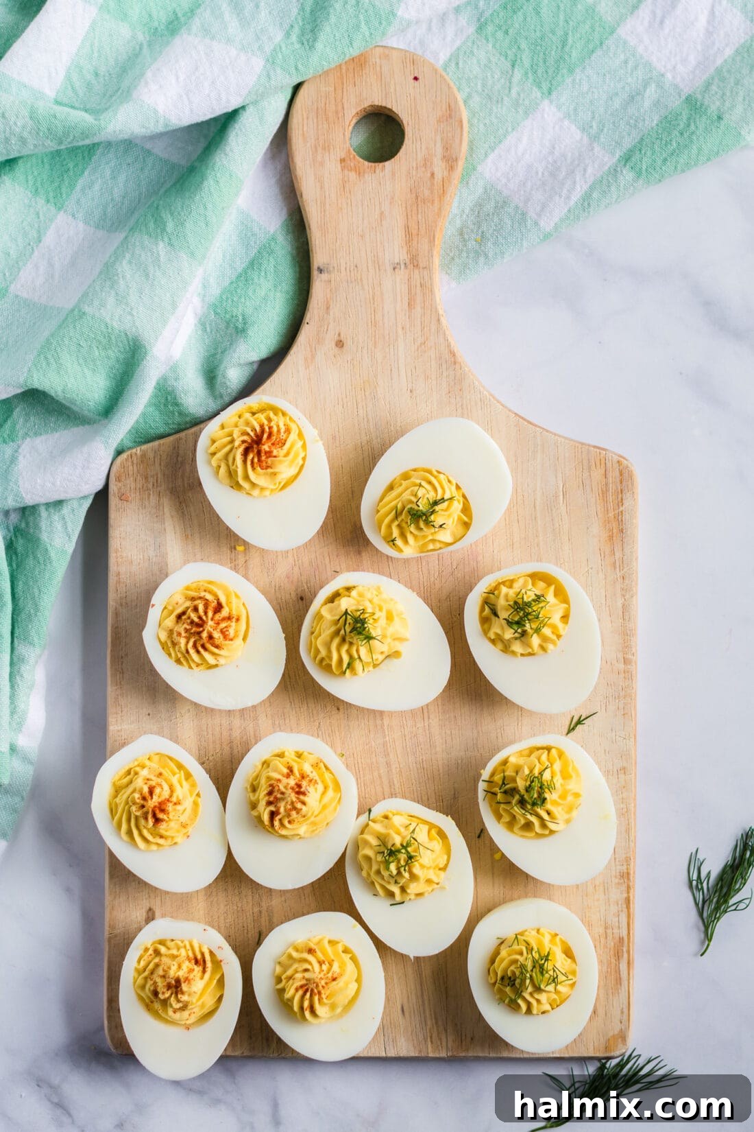Zesty Stuffed Eggs 2 Overhead photo of Deviled Eggs on a wooden board