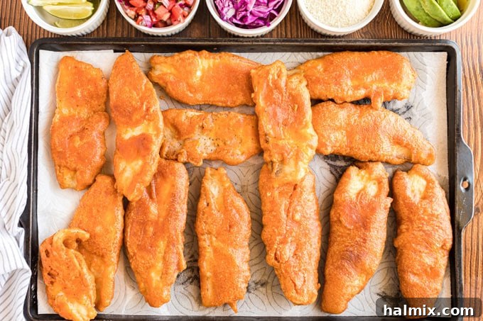 Baja Fish Bites 10 fried fish draining on paper towels