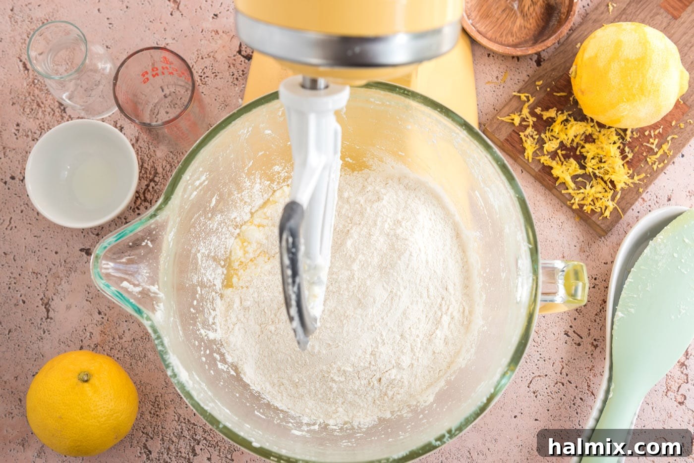 Tangy Lemon Clouds 11 Dry flour mixture being added to the wet ingredients for lemon drop cookie dough