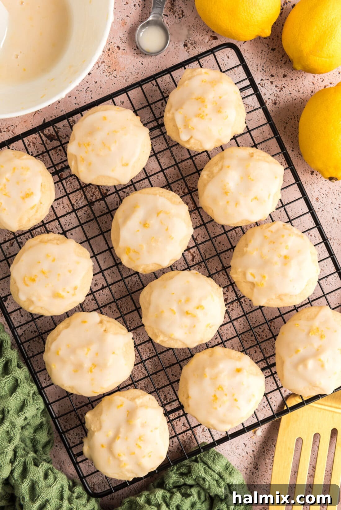 Tangy Lemon Clouds 3 Freshly baked Lemon Drop Cookies cooling on a wire rack