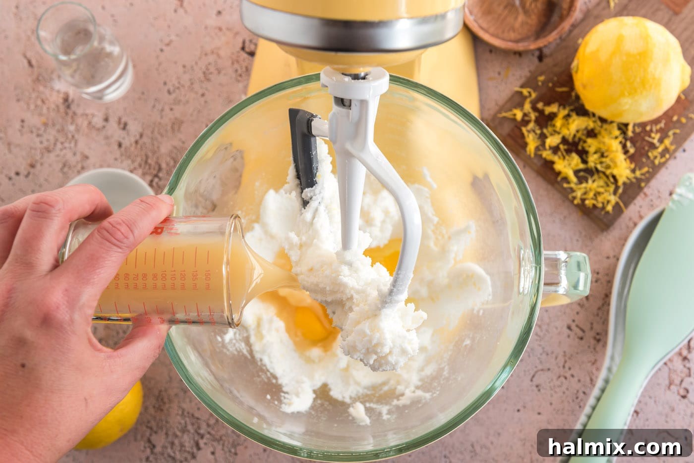 Tangy Lemon Clouds 10 Pouring fresh lemon juice into the wet cookie mixture