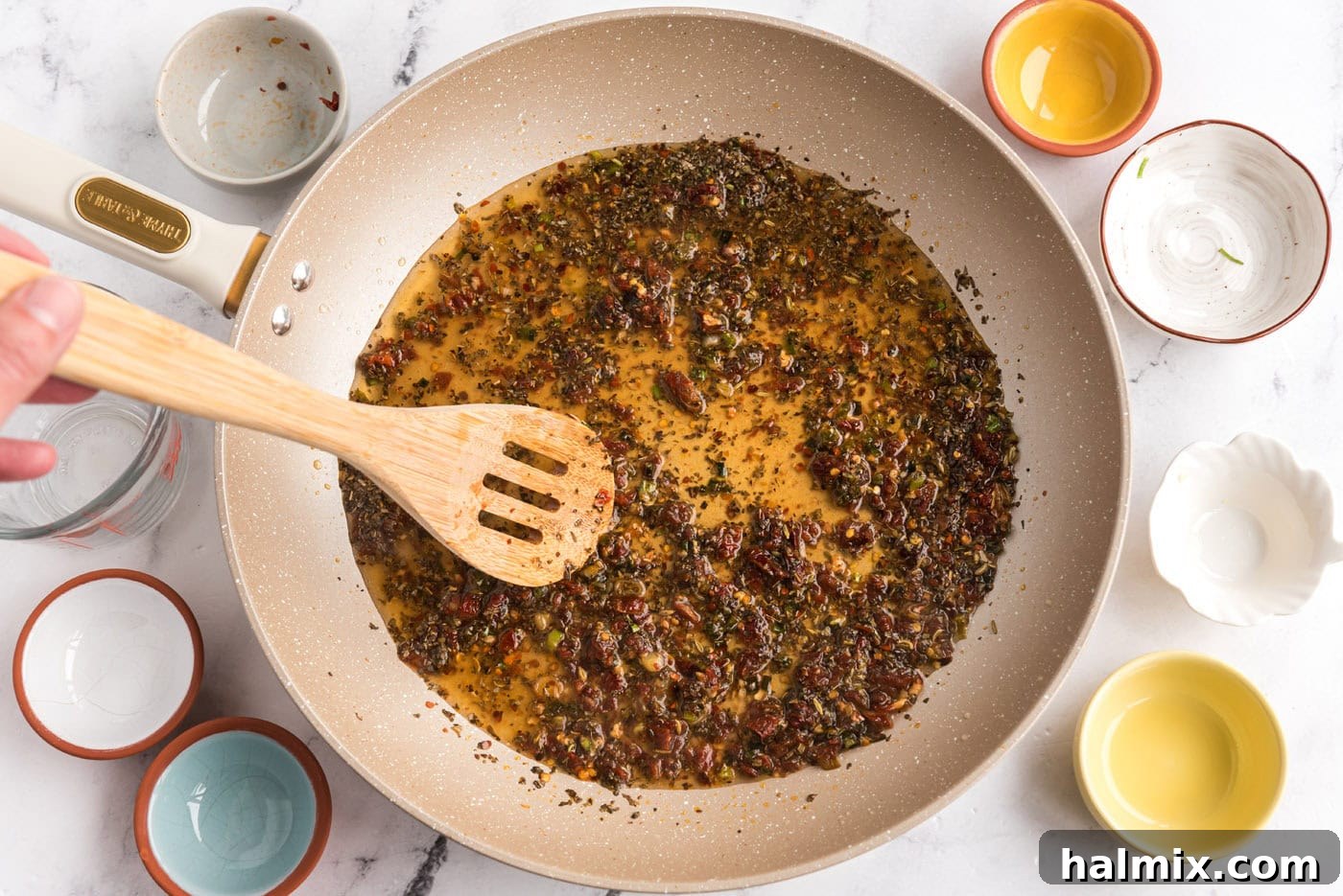 simmered sun dried tomato mixture in a skillet