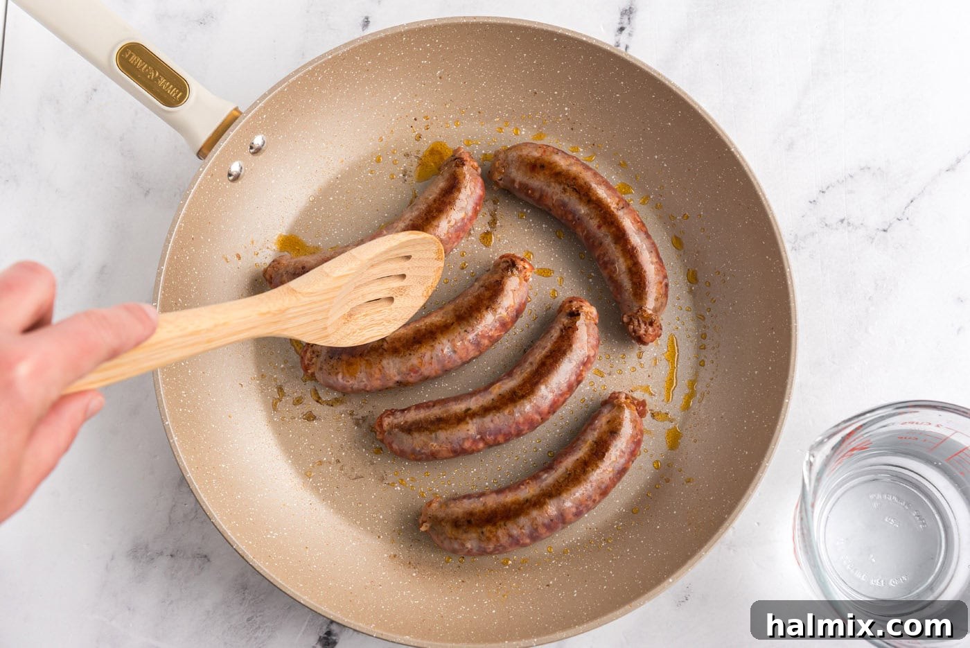 browned Italian sausage in a skillet