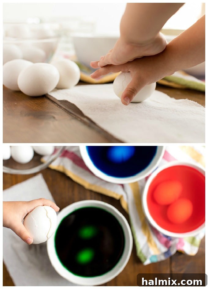 The Gentle Art of Cracking Easter Egg Shells A child's hands gently rolling a hard-boiled egg on a kitchen towel to create fine cracks in the shell, a crucial step for the cracked colored egg technique.