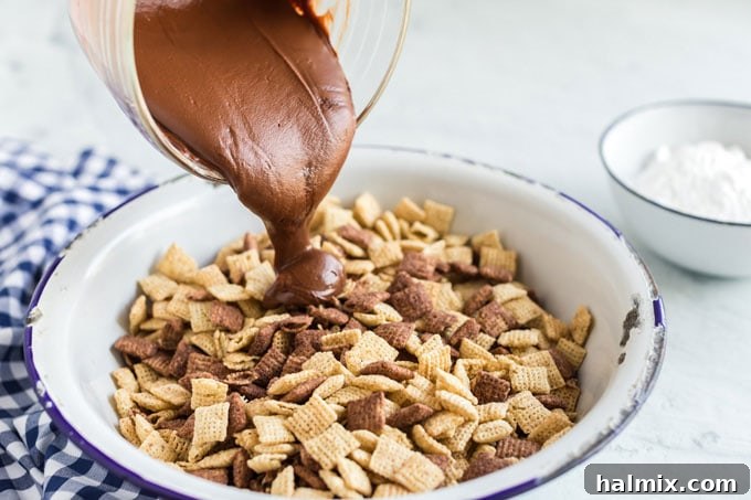 Chocolate Peanut Butter Snow Caps 7 pouring chocolate into chex cereal