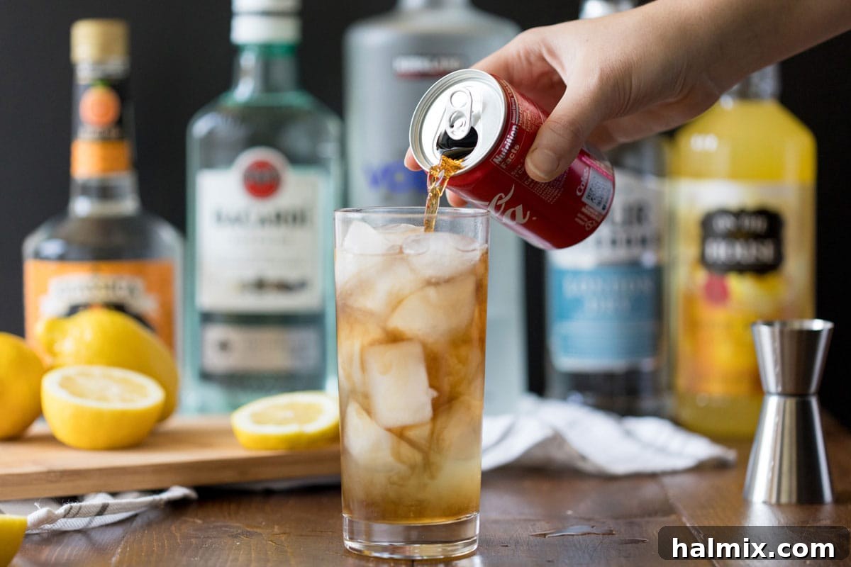 Long Island Iced Tea 5 adding cola to a long island iced tea