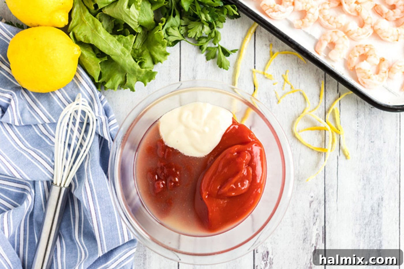 Chili sauce, ketchup, horseradish and lemon juice in a bowl