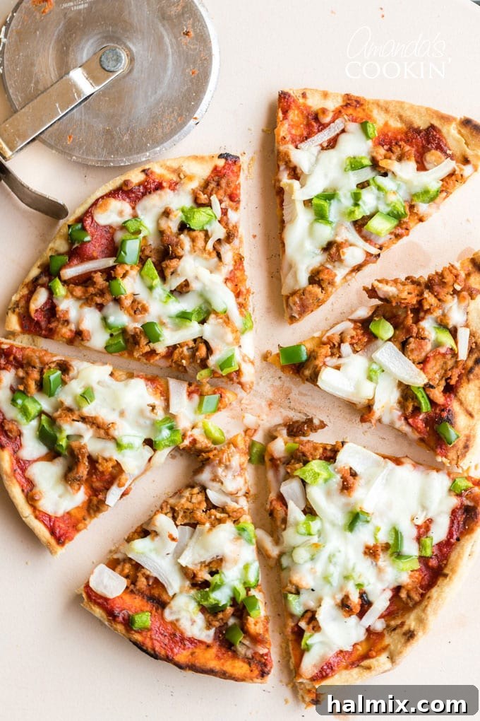 A freshly grilled pizza, perfectly cut into satisfying slices, ready to be served and enjoyed.