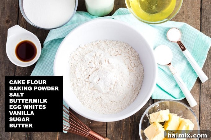 Timeless Vanilla White Cake 3 labeled ingredients for white cake recipe: cake flour, baking powder, salt, buttermilk, egg whites, vanilla, sugar, butter