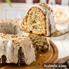 Slice of Banana Bundt Cake held up on a pie server