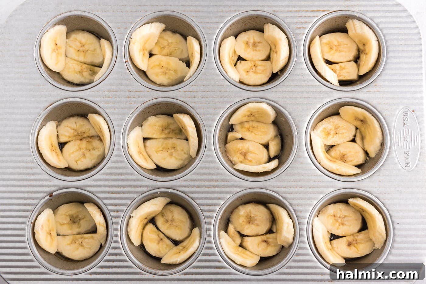 banana sliced in a muffin pan