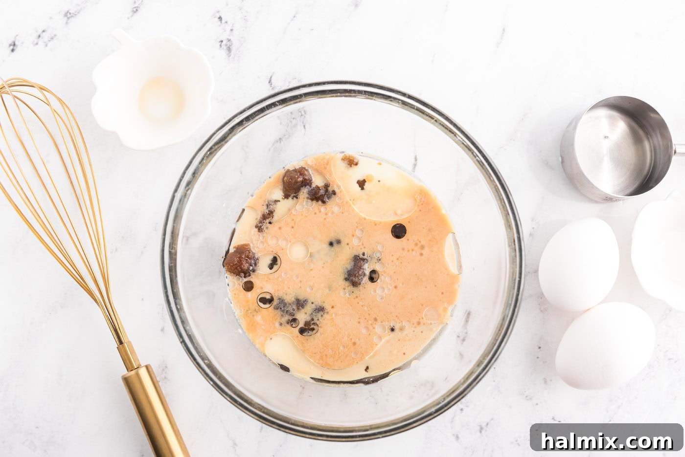 brown sugar, oil, milk, and rum in a bowl