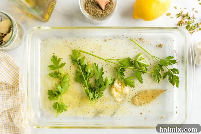 Zesty Lemon Herb Grilled Pork Chops 2 marinade ingredients in a pan