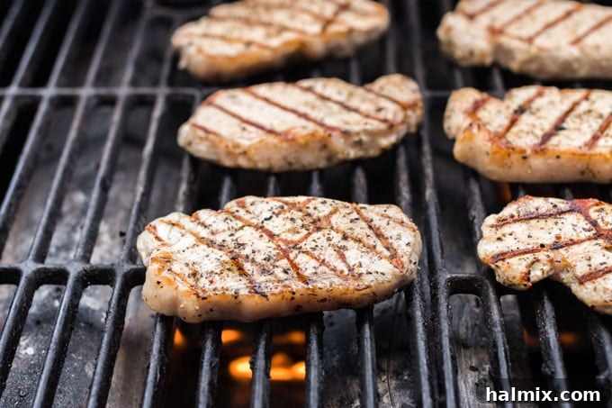 Zesty Lemon Herb Grilled Pork Chops 5 chops on the grill