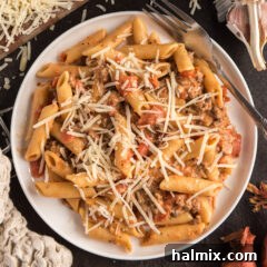 Close up photo of Penne with Tomato Sage Sausage Sauce on a plate