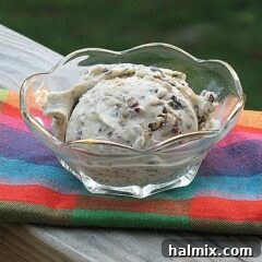 Caramel Chocolate Nut Crunch Ice Cream 2 A photo of a bowl of caramel chocolate nut ice cream.