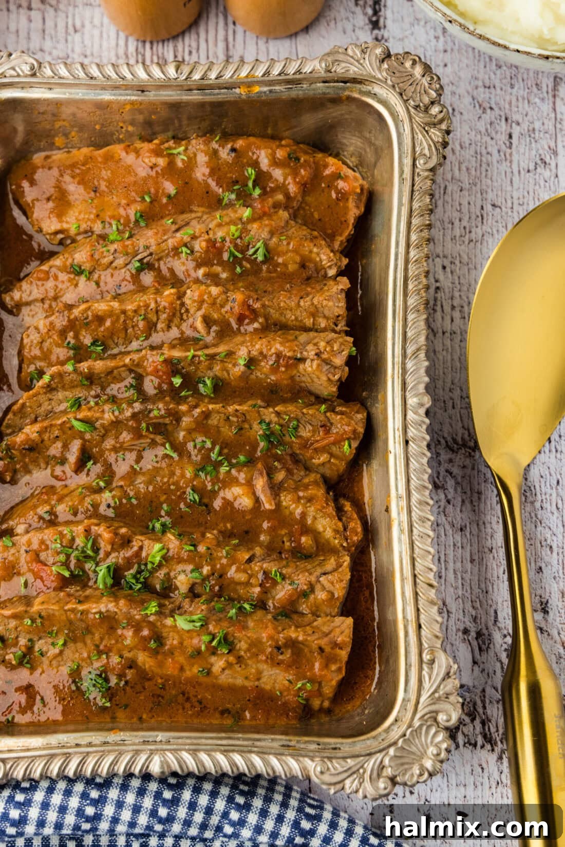 Tender Beef Brisket with Rich Gravy 2 sliced beef brisket and gravy in a platter