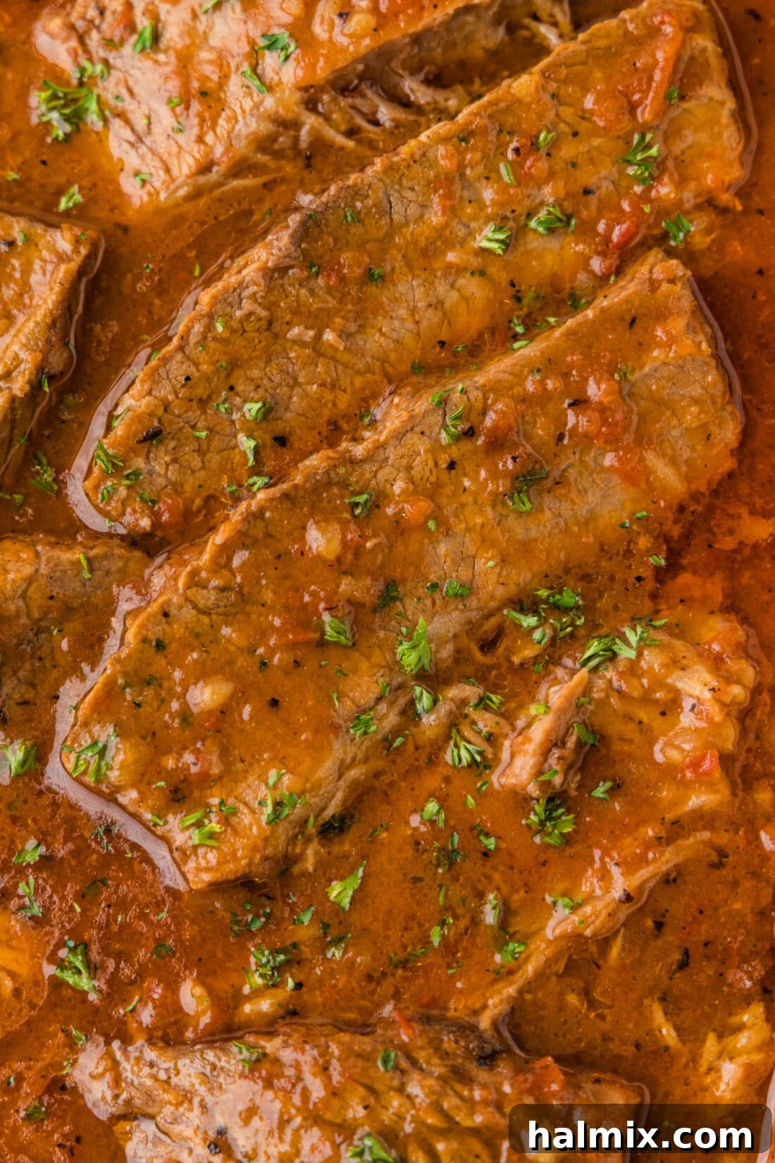 Tender Beef Brisket with Rich Gravy 3 closed of of sliced beef brisket and gravy