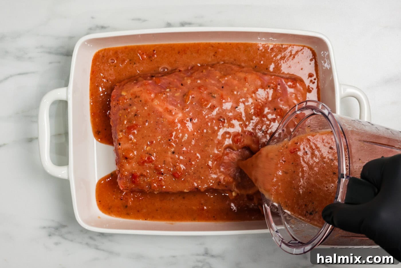 Tender Beef Brisket with Rich Gravy 6 pouring gravy mixture over brsket