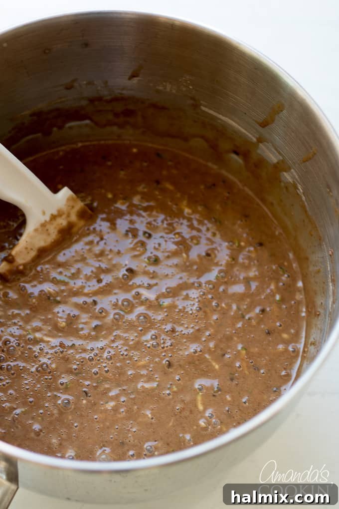 Chocolate Zucchini Bread Batter Ready to Bake Finished chocolate zucchini bread batter in a mixing bowl, ready for the loaf pans.