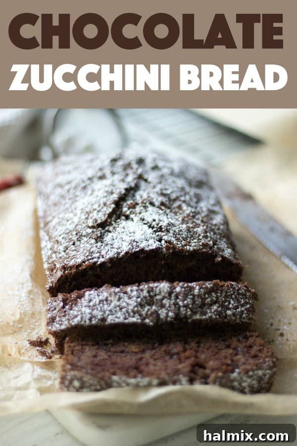 This chocolate zucchini bread is moist, chocolatey and every bit of delicious. It's a nice treat to bring to coworkers, neighbors, or to enjoy yourself. #chocolate #zucchinibread #quickbread #bread Chocolate Zucchini Bread