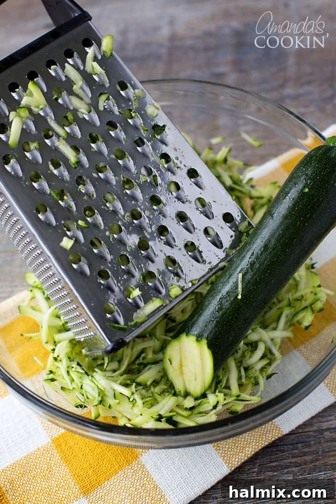 Secret Garden Chocolate Loaf 2 Freshly grated zucchini in a bowl, ready to be incorporated into the bread batter.