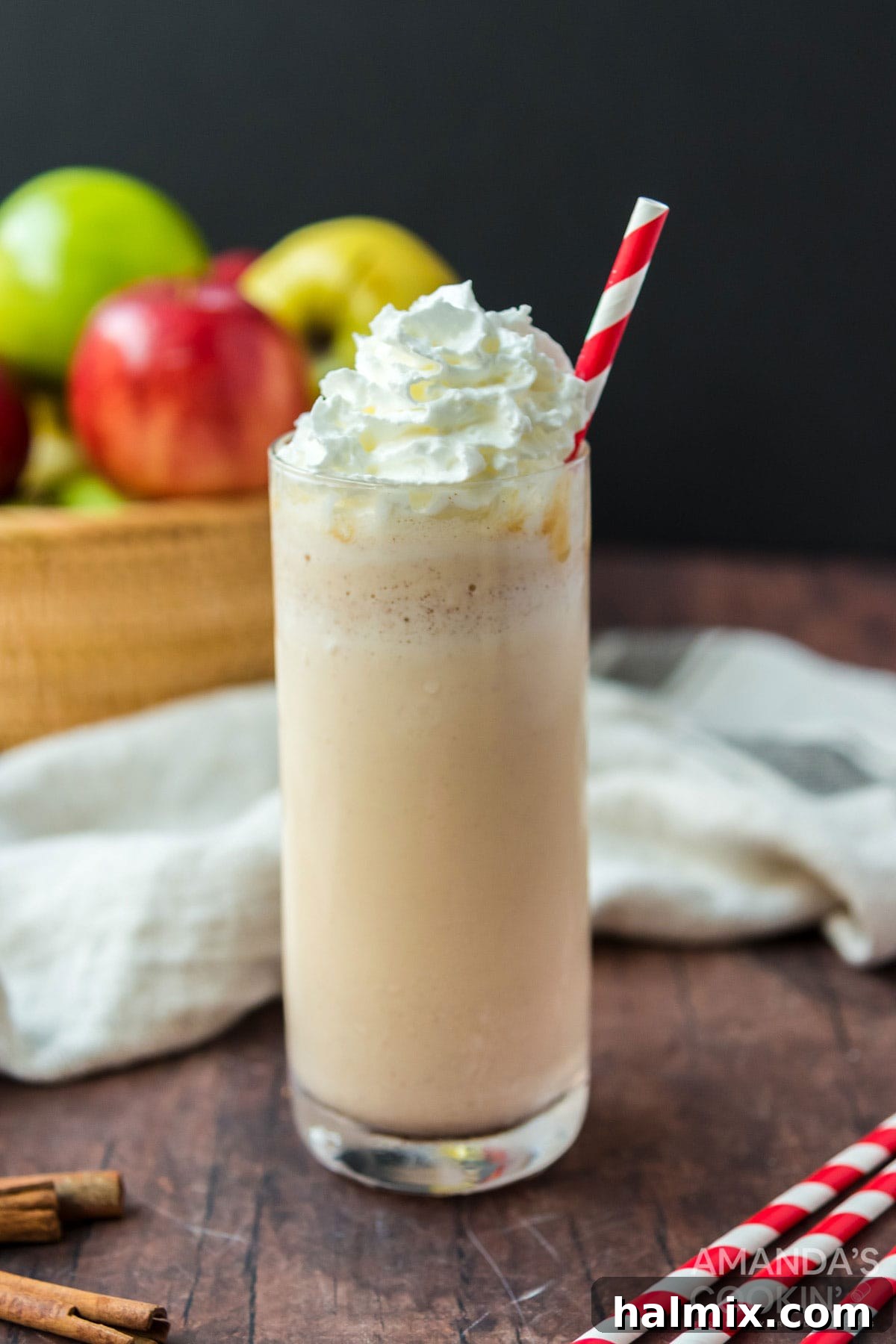 Only 3 ingredients for this delicious, fall inspired apple cider milkshake. So easy to make and a an amazing way to wrap up summer. A tall glass of apple cider milkshake topped with whipped cream and a sprinkle of cinnamon