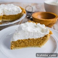 slice of pumpkin pie on a plate
