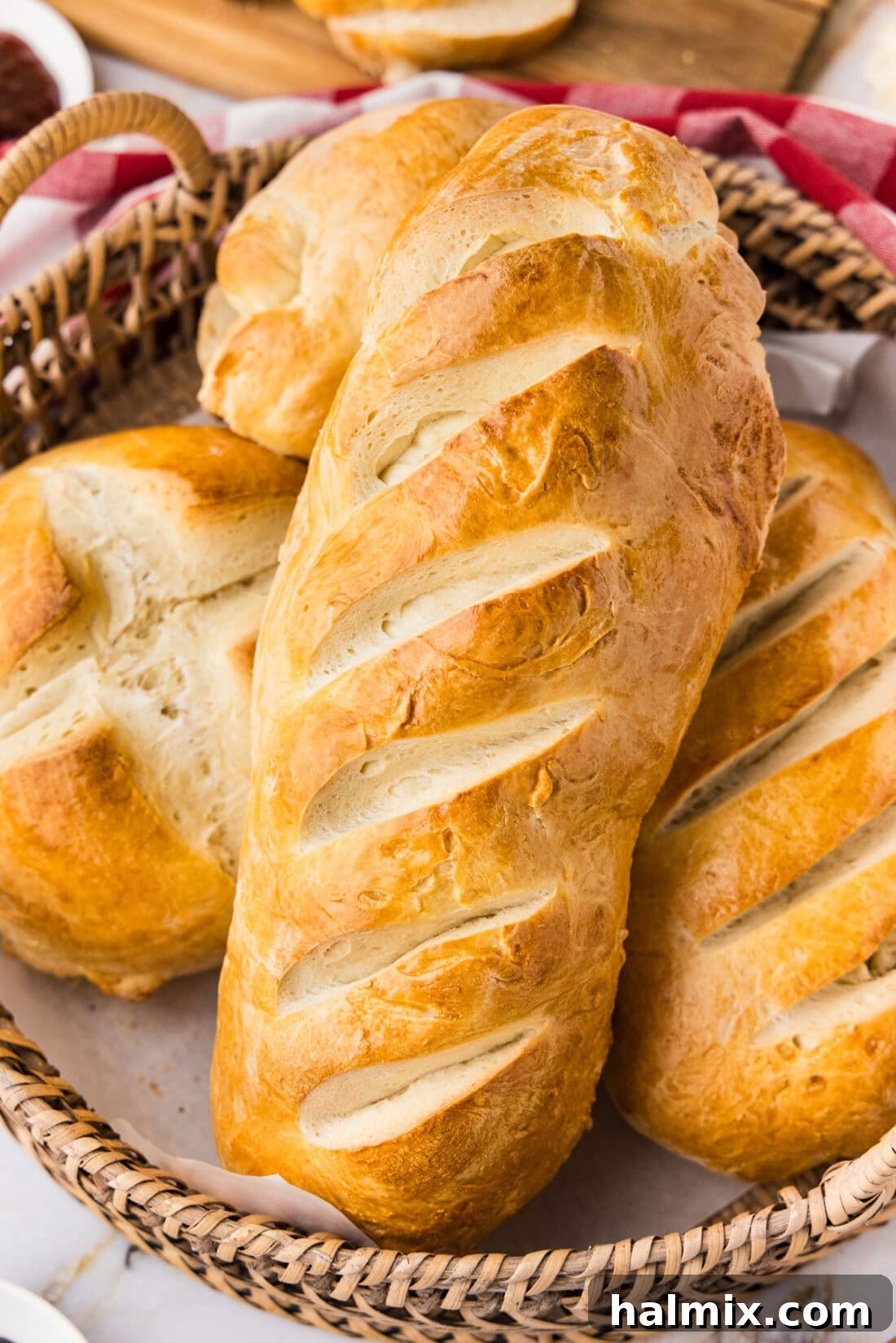 The 60-Minute Loaf 2 Basket of One Hour Bread loaves, golden brown and perfectly baked