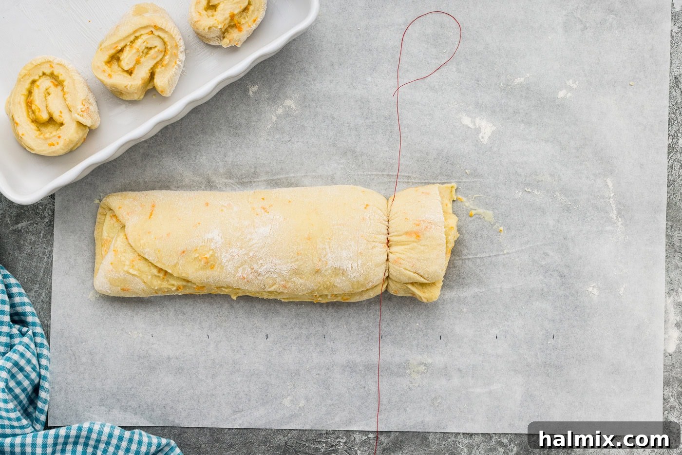 Slicing dough log with string