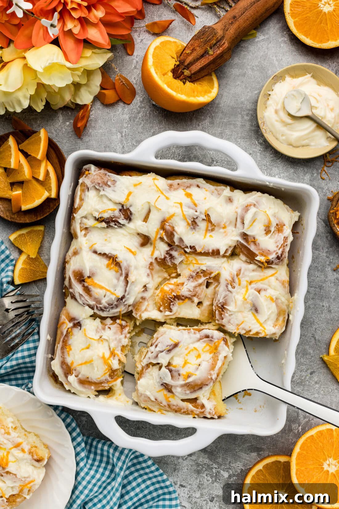 Pan of Quick Orange Rolls with one removed