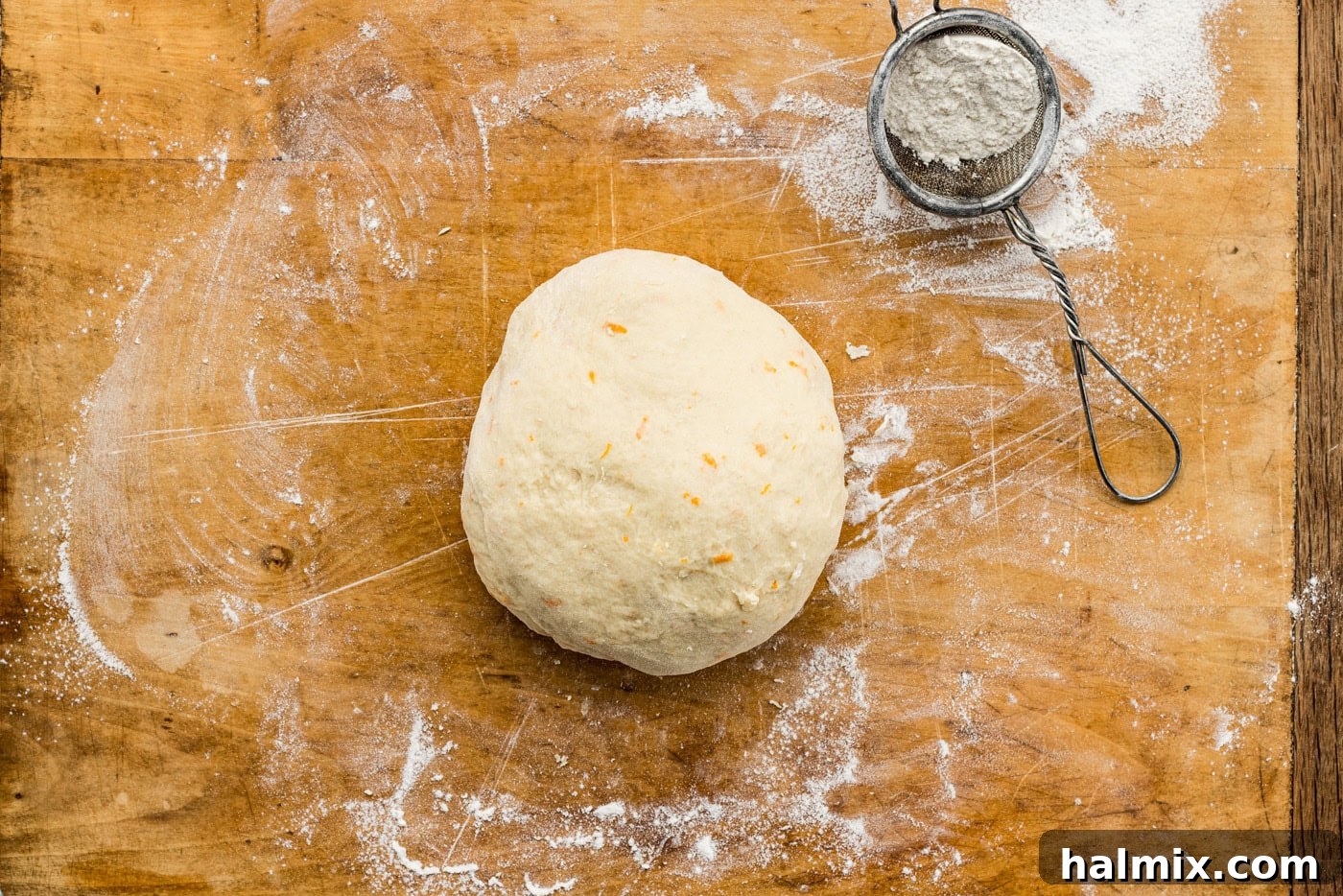 dough ball on a lightly floured surface
