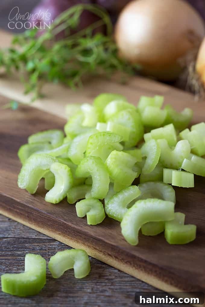 Homemade pot pie, brimming with fresh vegetables and a rich sauce, ready for its flaky crust.