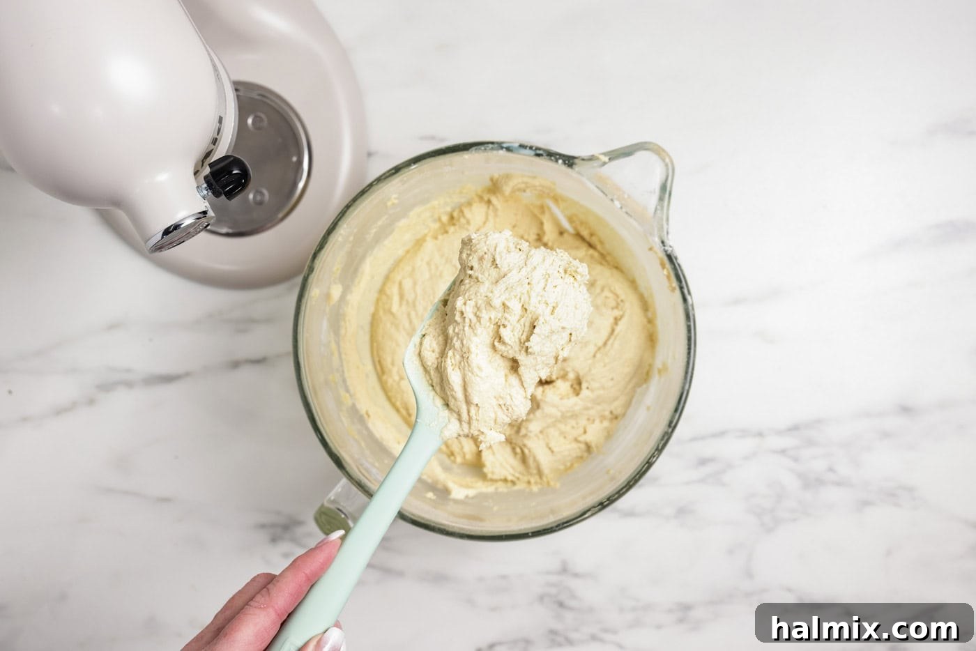 Cookie dough scooped onto a rubber spatula