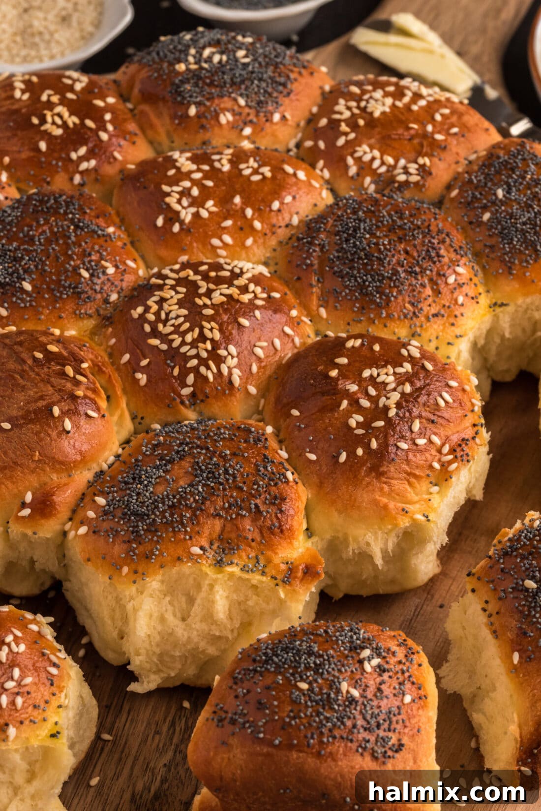 Festive German Bread 23 Close-up photo of freshly baked Partybrot rolls with a perfect golden crust and seed topping.