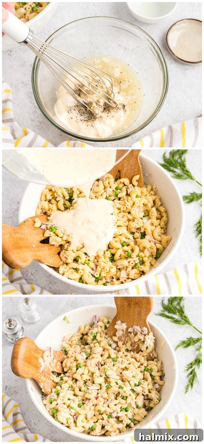 Creamy mayonnaise and lemon juice dressing being poured over the pasta, tuna, and vegetable mixture in a large mixing bowl.