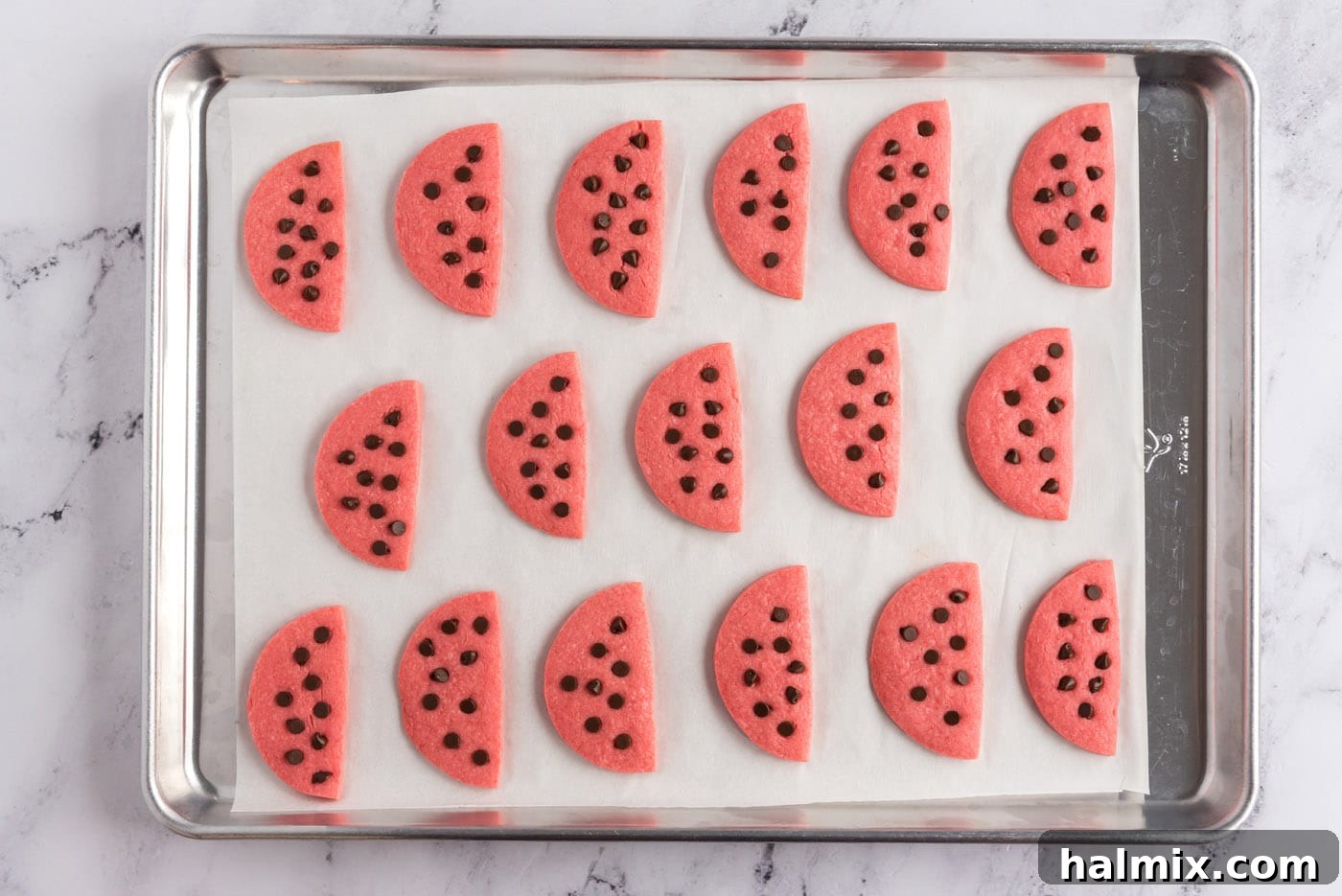 watermelon cookies on a baking sheet