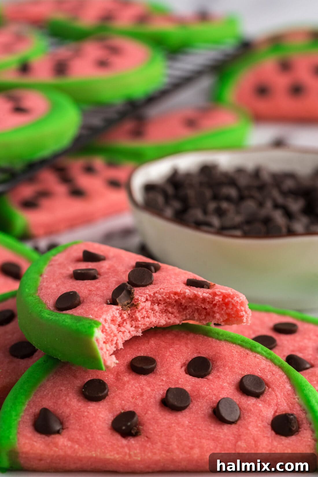 Close up photo of a Watermelon Cookie with a bite taken out