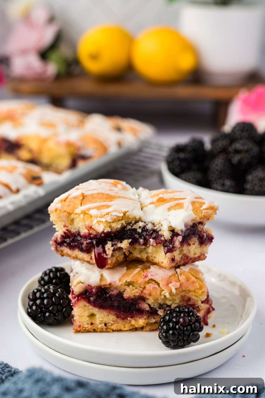 Stack of two Blackberry Pie Squares on a plate