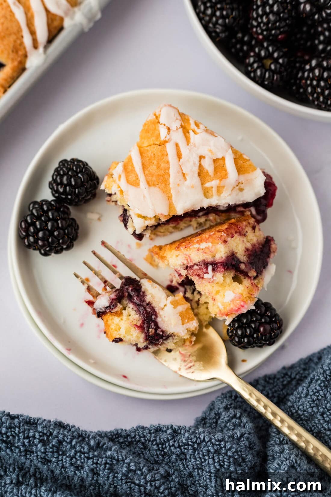 Blackberry Pie Square broken up on a plate with a fork