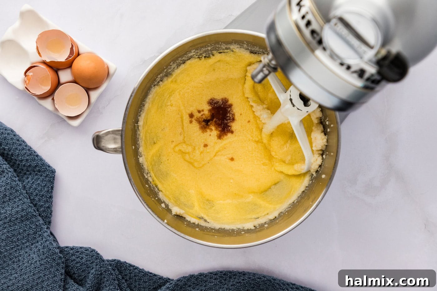 vanilla added to butter mixture in a stand mixer bowl