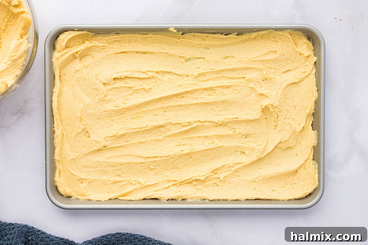 cookie batter spread onto a baking pan