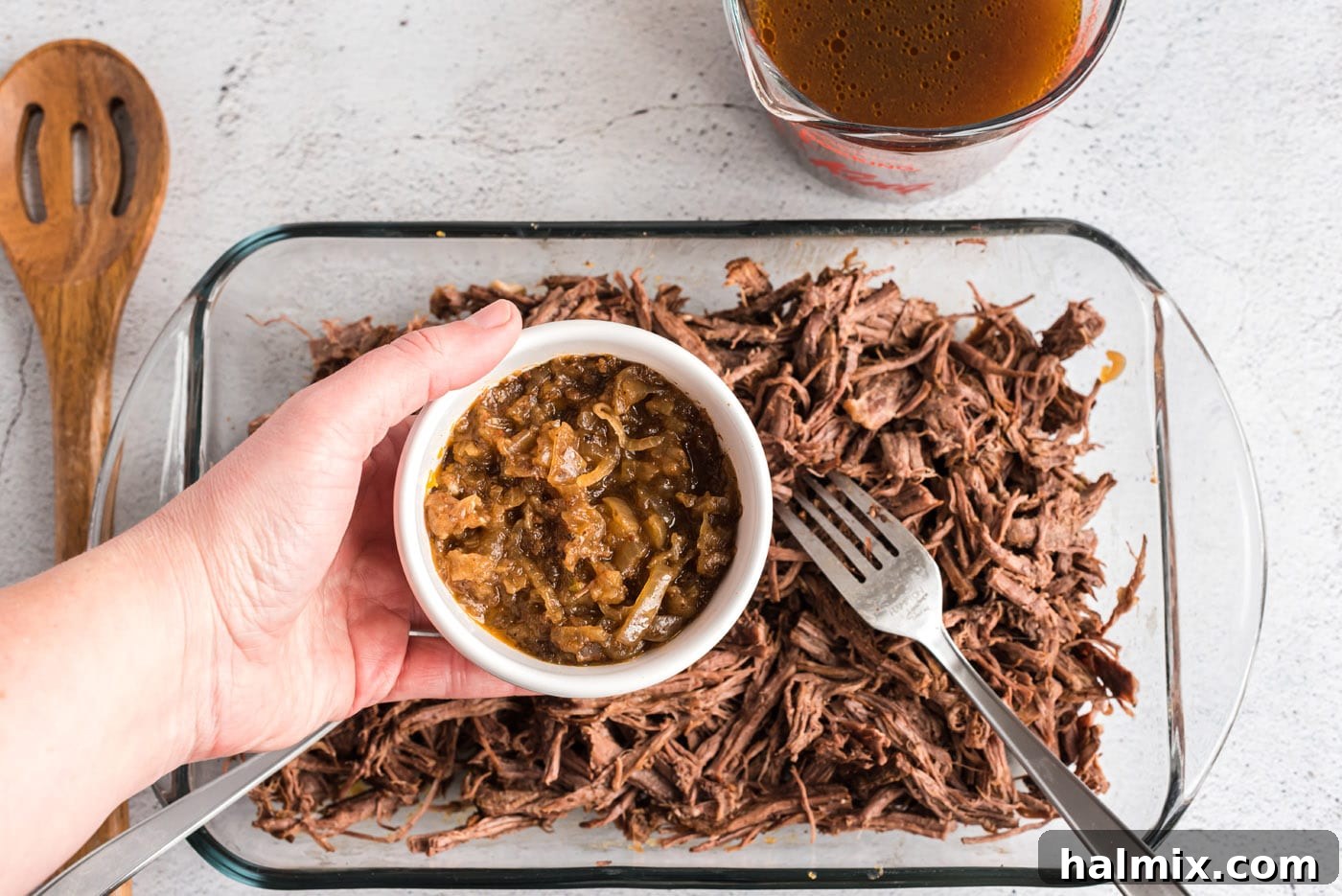 adding onions to beef