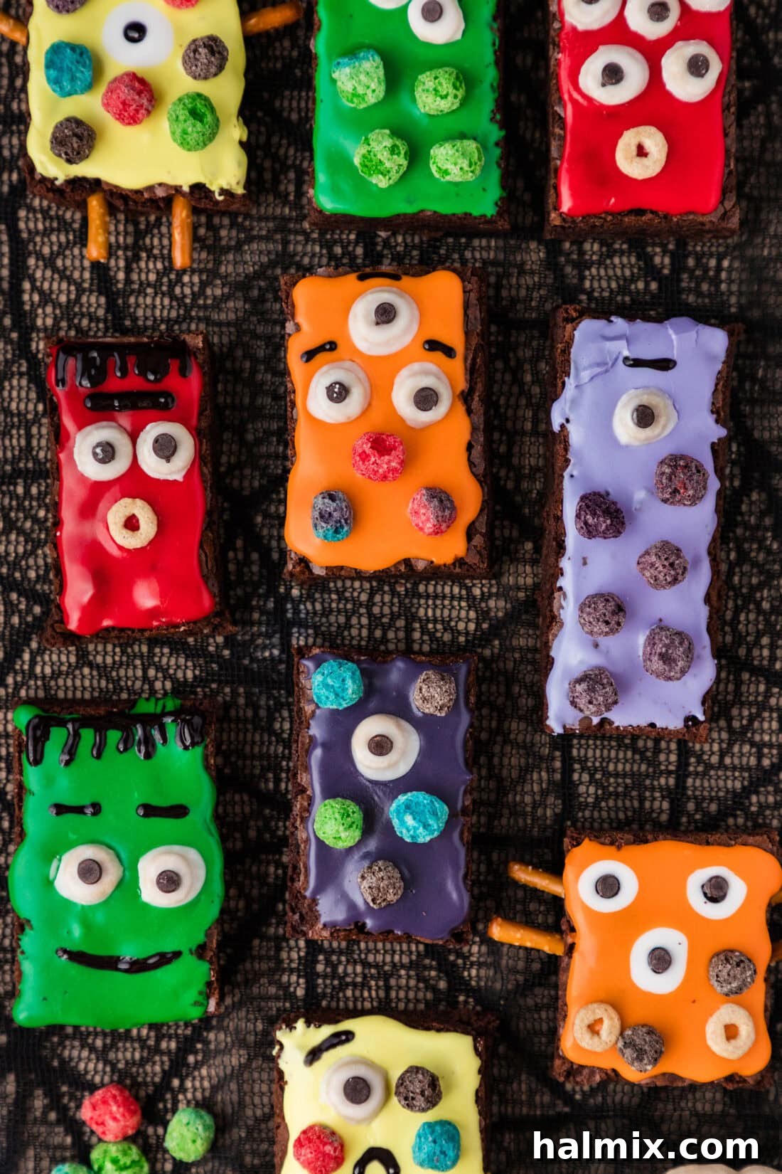 Monster Brownies resting on a spiderweb tablecloth, ready for a Halloween party