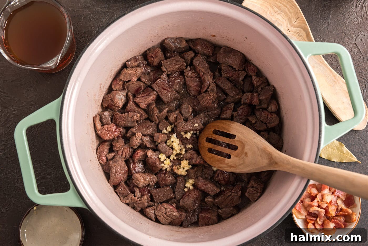 Perfectly browned beef cubes, rich in color, resting in the Dutch oven after searing, ready for the next step.